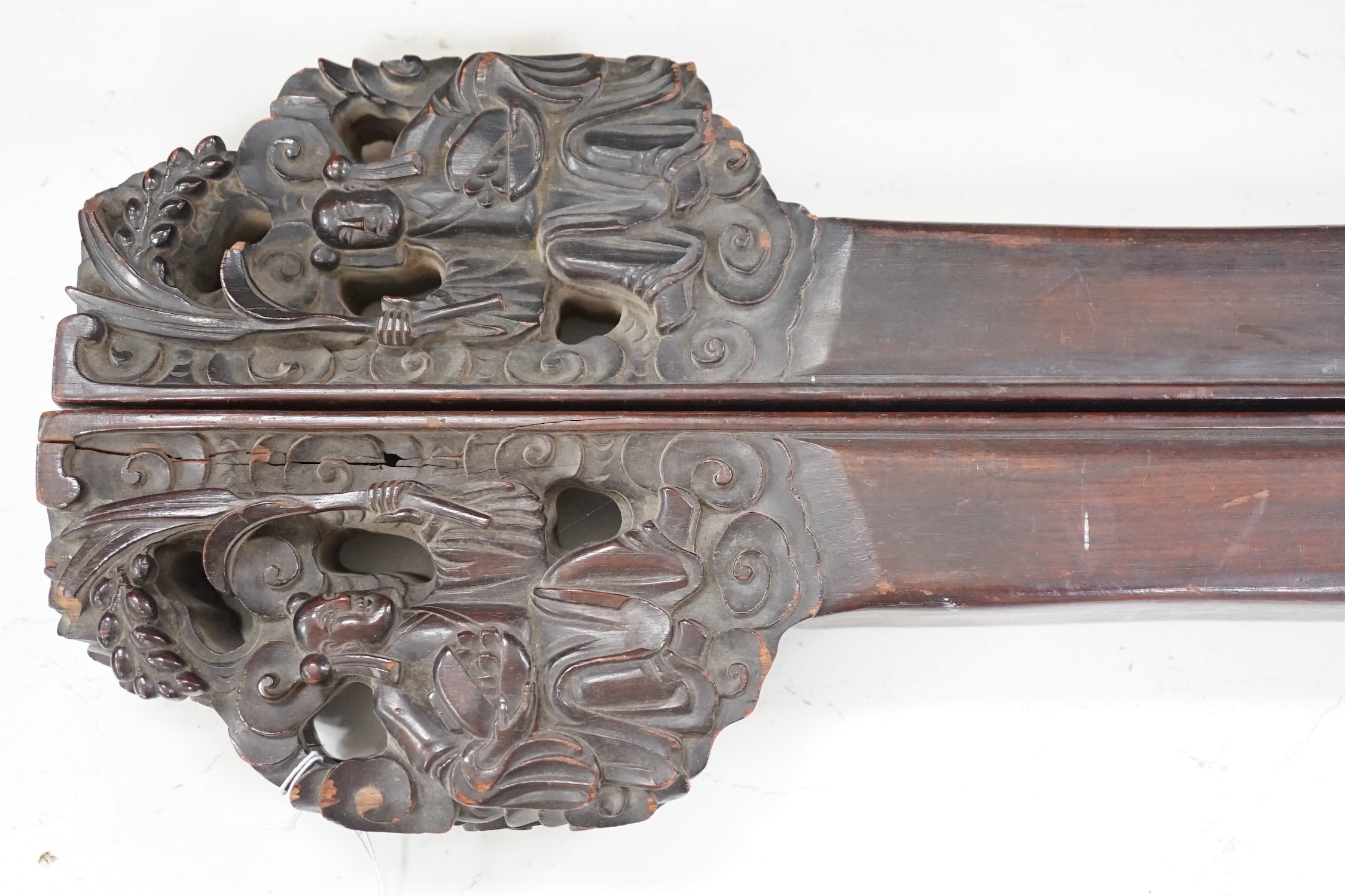 A pair of 19th century Chinese carved hardwood rails, 93cm